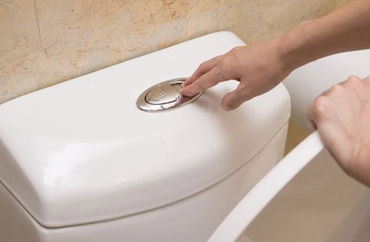 Toilet flush button popped out