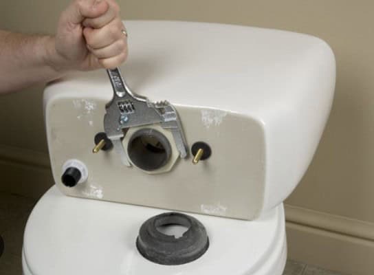 Toilet leaking between tank and bowl when flushed